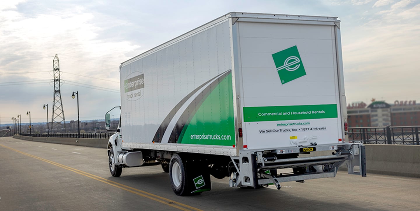 Employees loading an Enterprise Rental Truck
